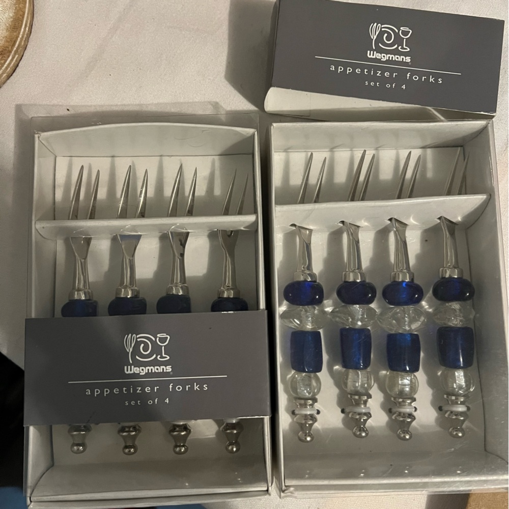8 clear and blue appetizer forks